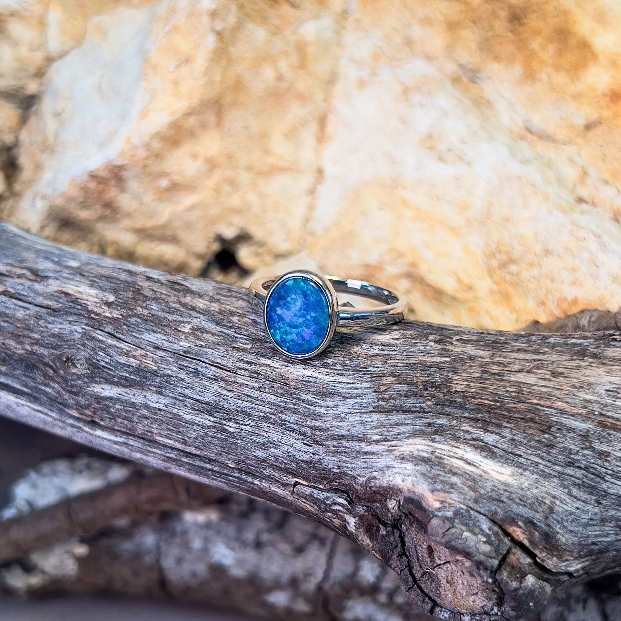 14kt White Gold solitaire Black Opal 1.47ct bezel set ring