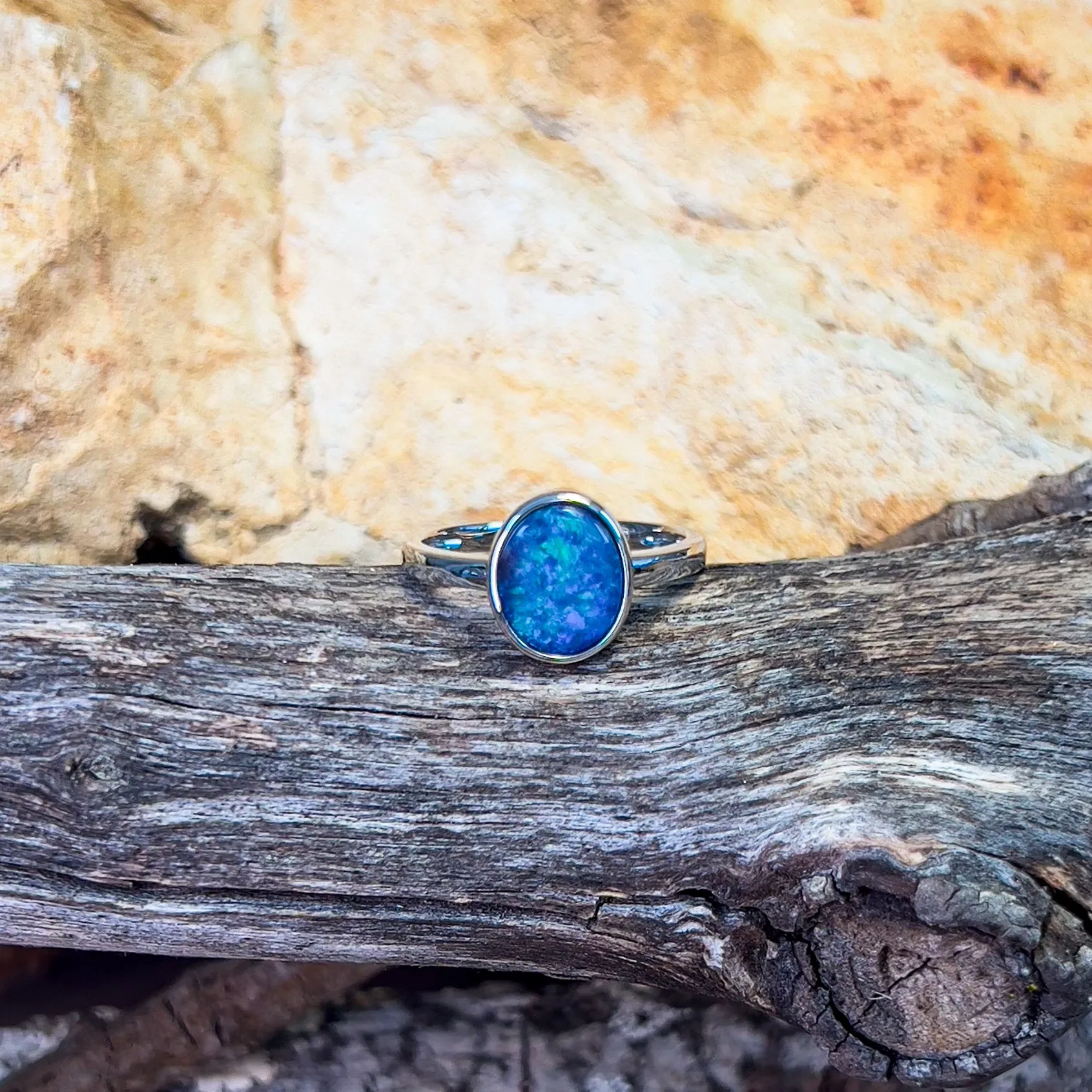 14kt White Gold solitaire Black Opal 1.47ct bezel set ring