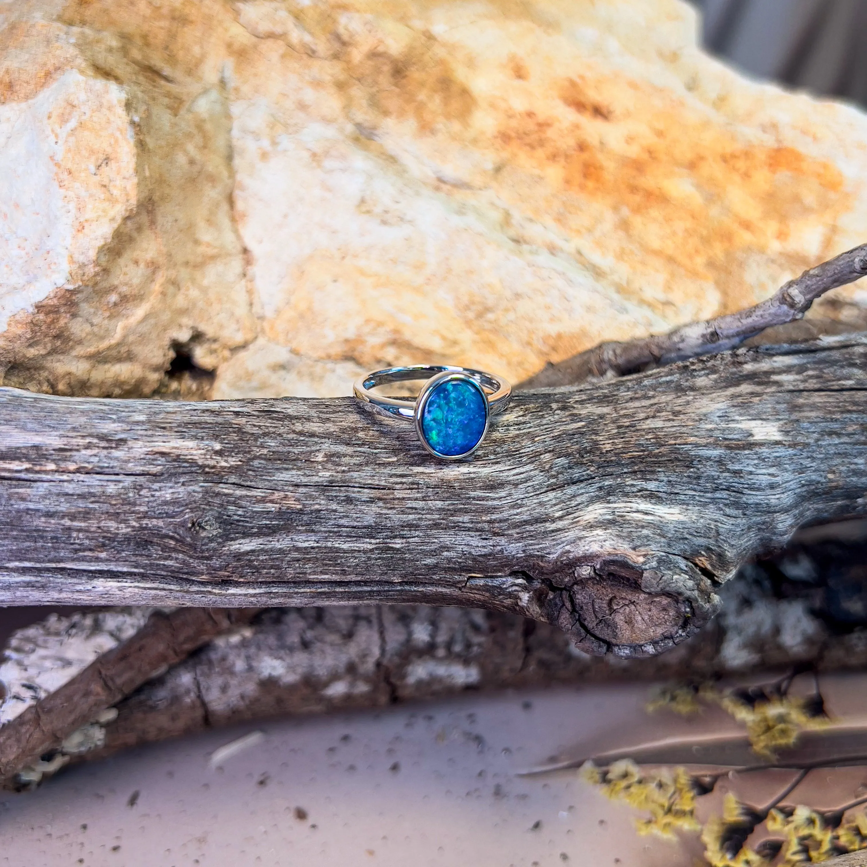 14kt White Gold solitaire Black Opal 1.47ct bezel set ring